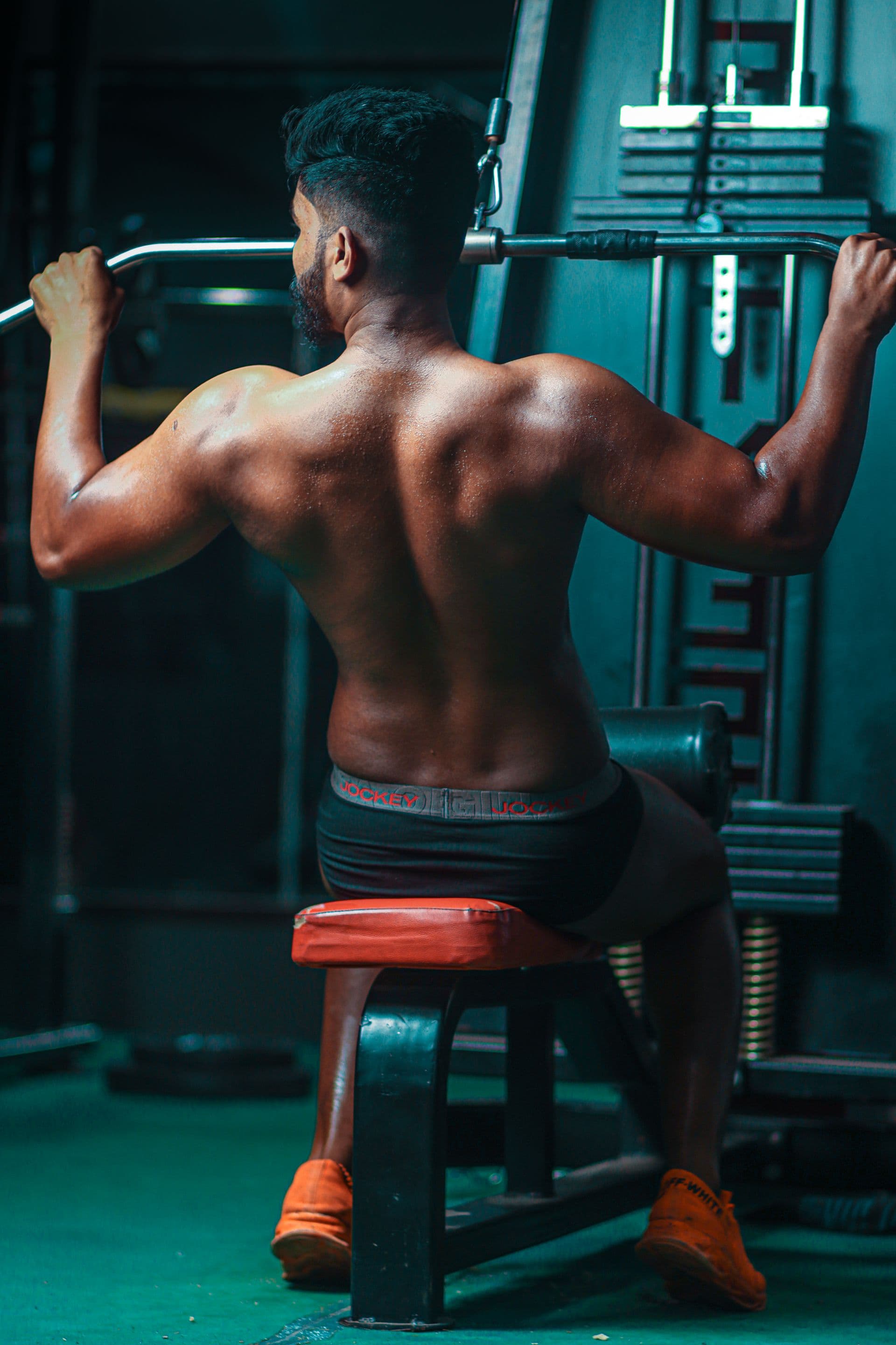 Athlete performing lat pulldown
